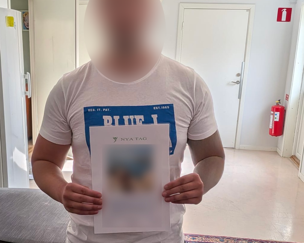 klient med diplom